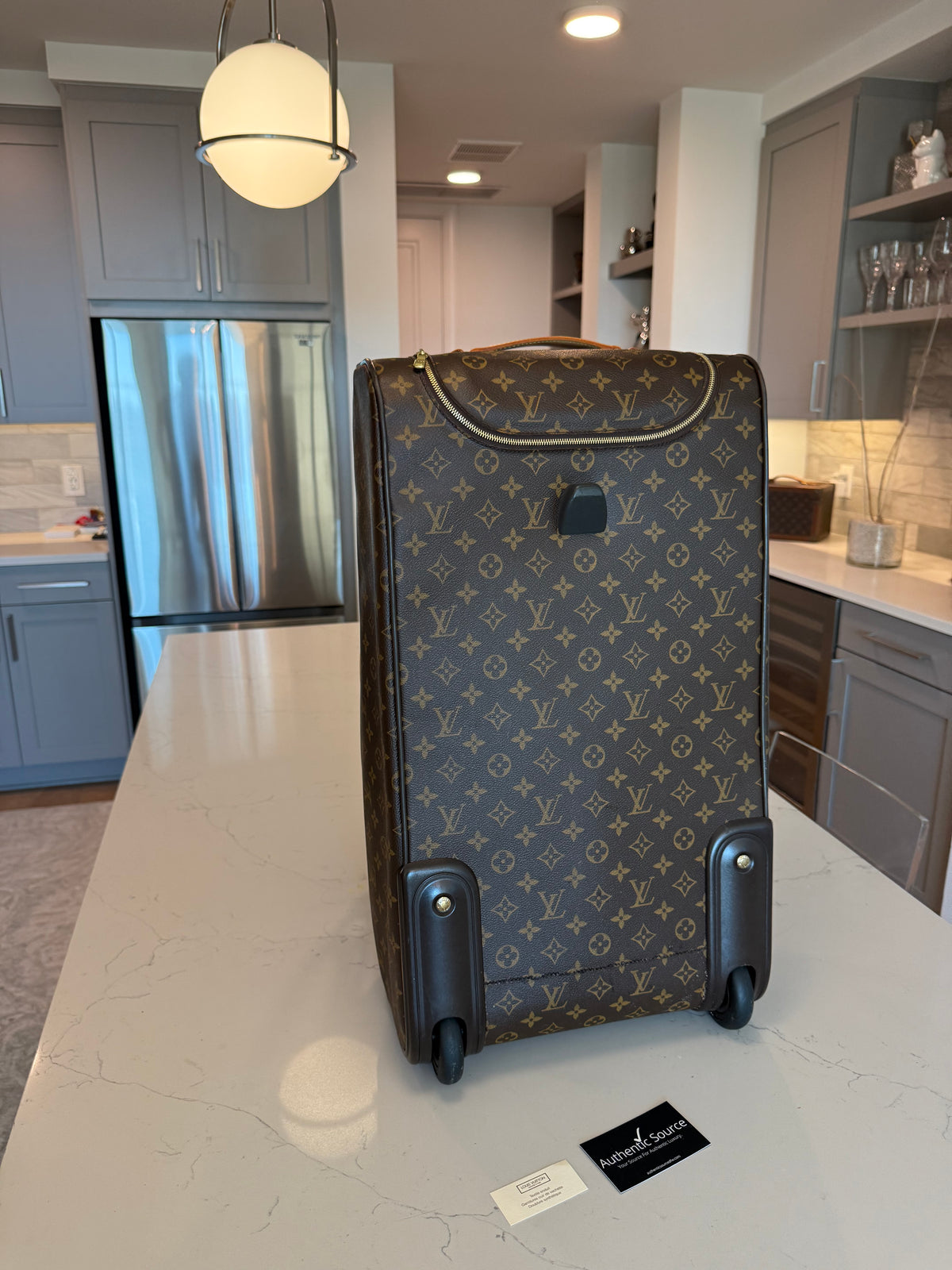 Louis Vuitton Eole Rolling Duffle