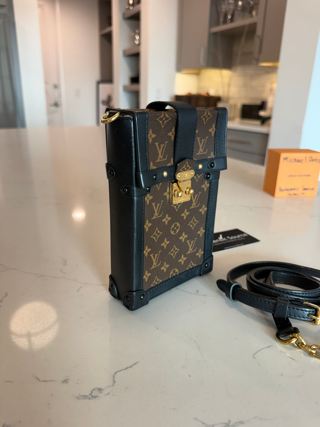 Louis Vuitton Monogram Trunk Pouchette Verticale