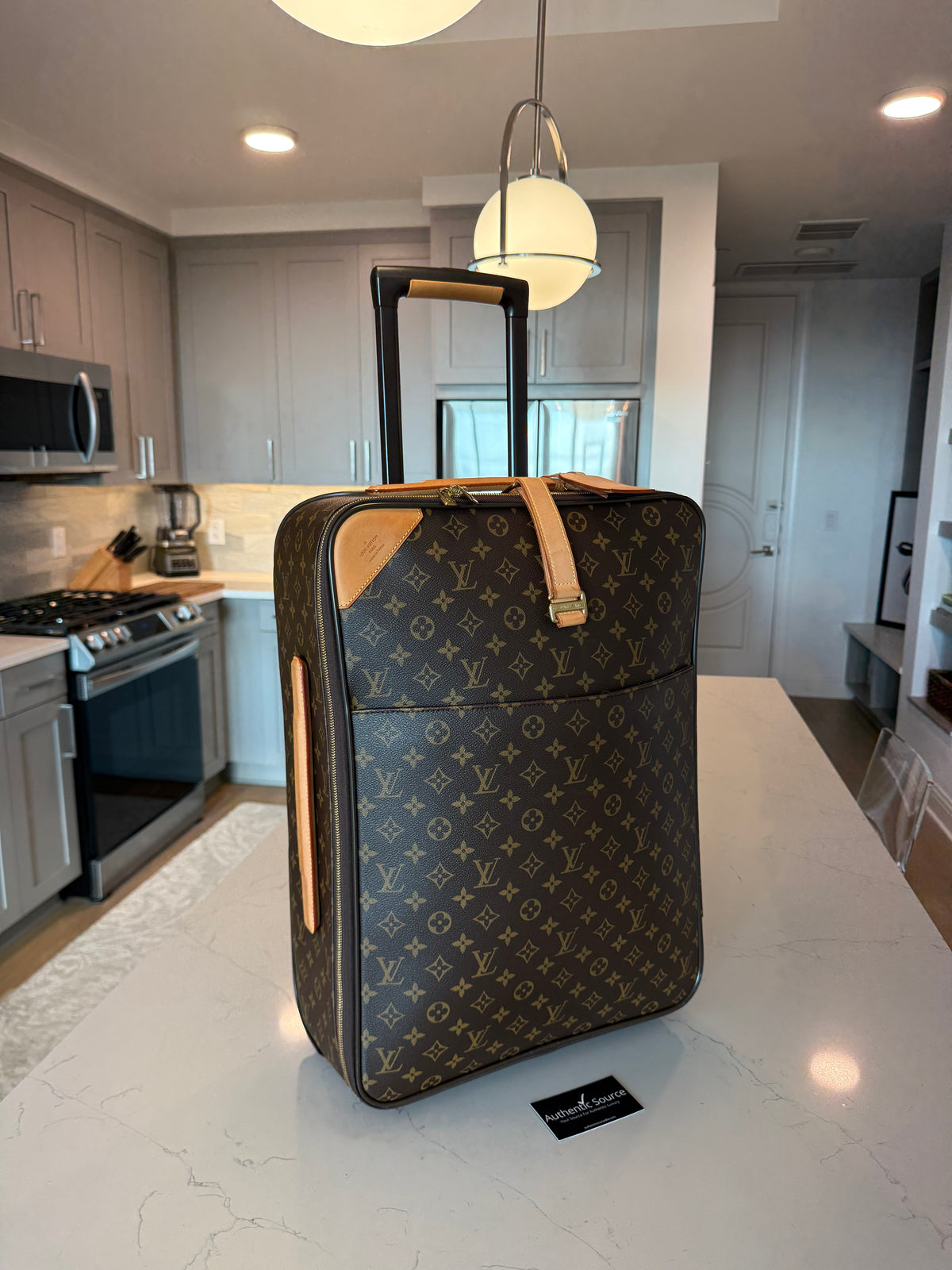 Louis Vuitton Pegase 55 Rolling Luggage
