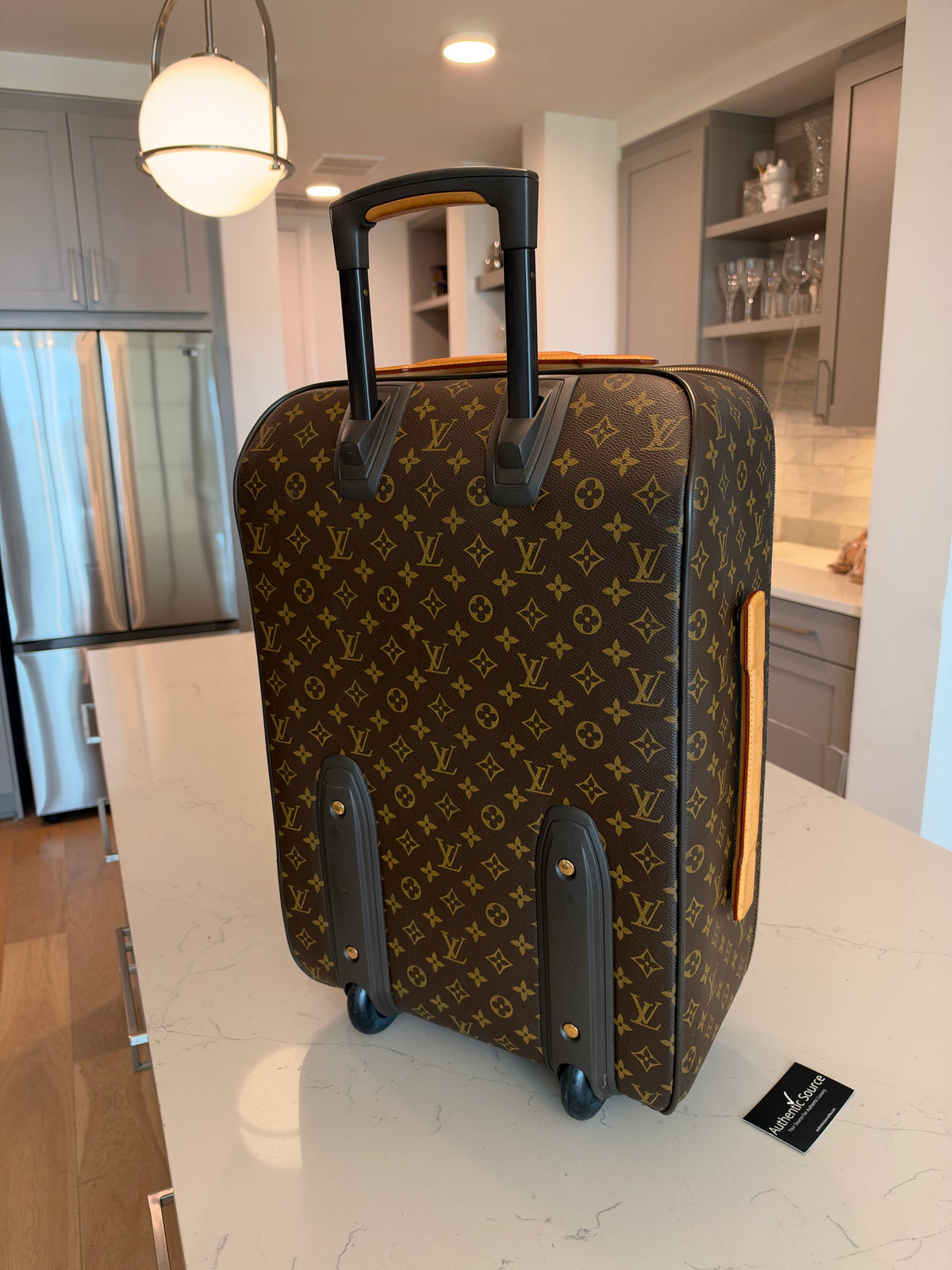 Louis Vuitton - Pegase 55 Rolling Luggage