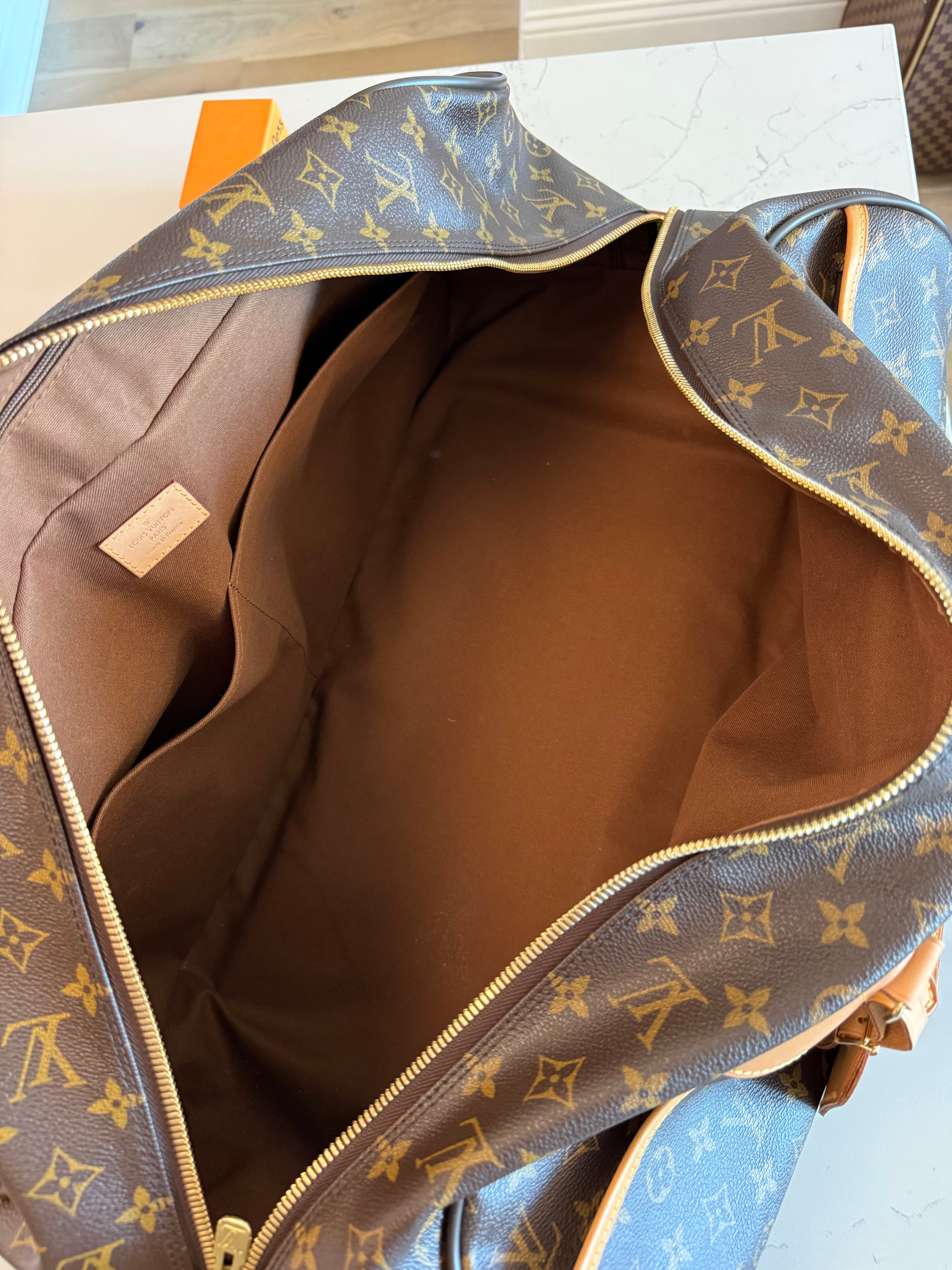 Louis Vuitton Eole Rolling Duffle