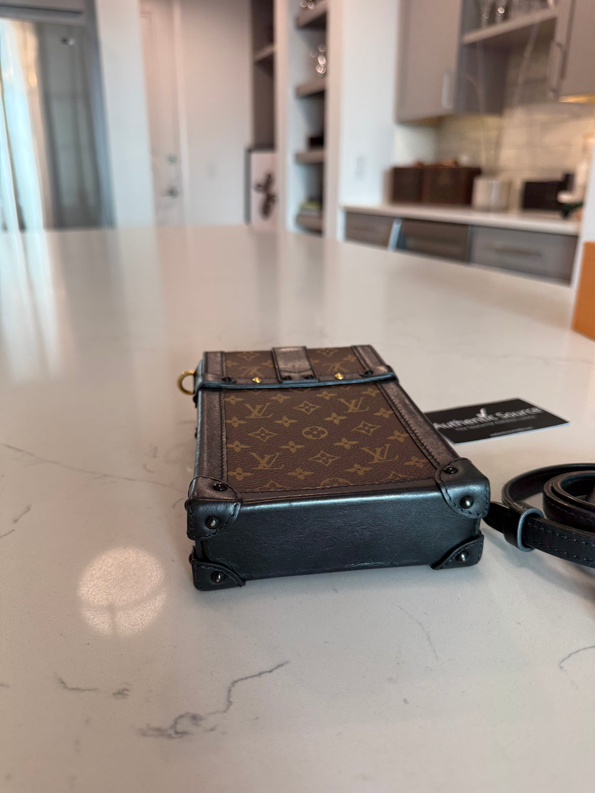 Louis Vuitton Monogram Trunk Pouchette Verticale
