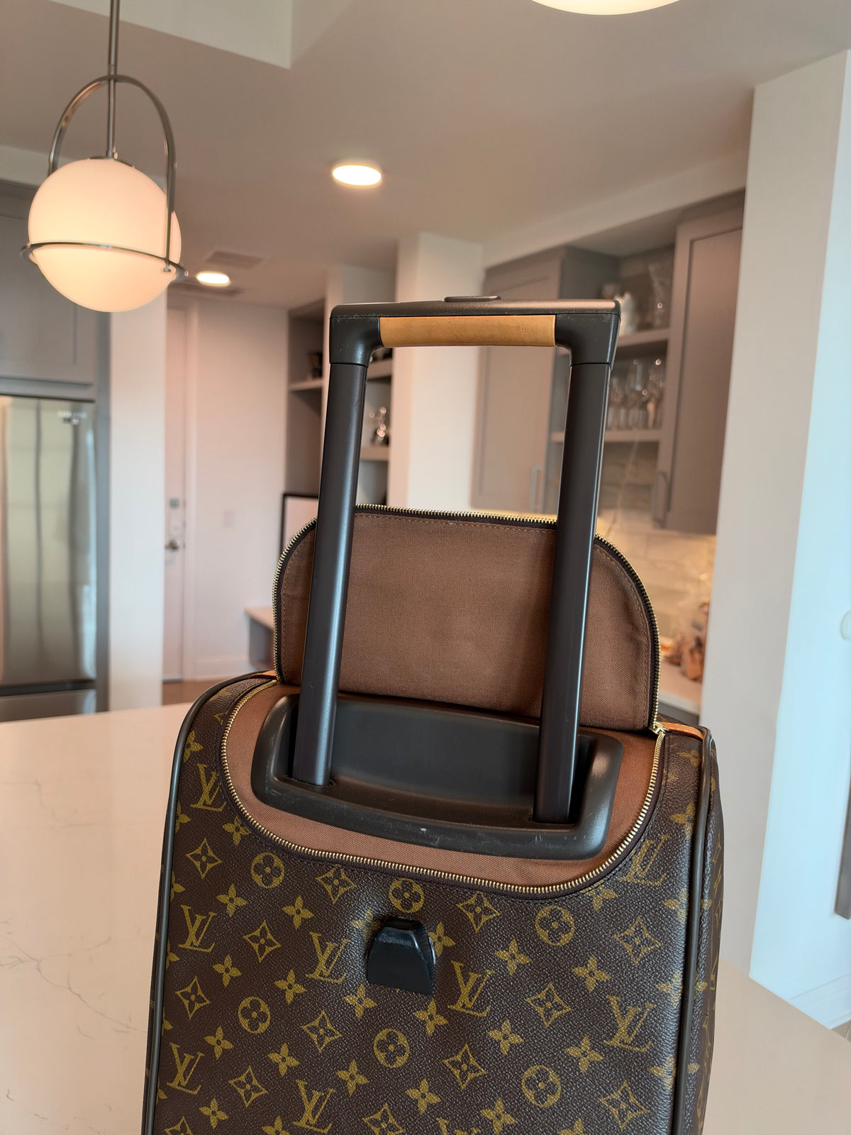 Louis Vuitton Eole 50 Rolling Duffle