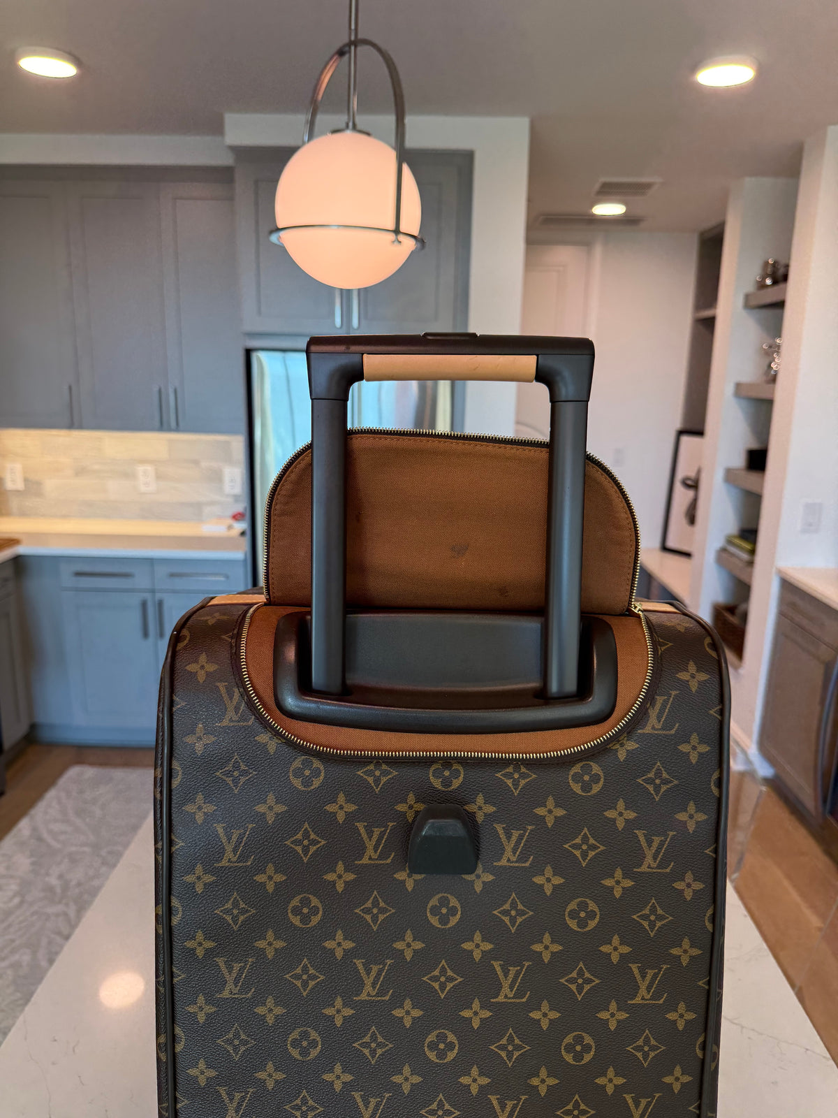 Louis Vuitton Eole Rolling Duffle