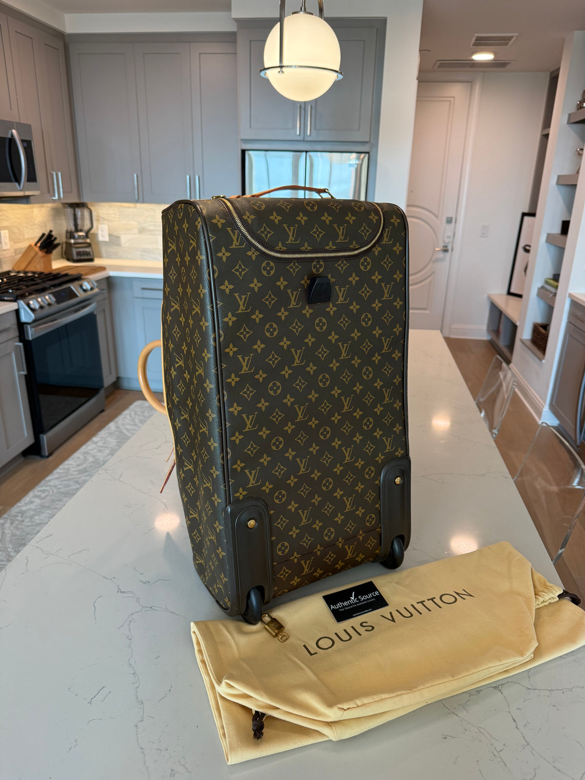 Louis Vuitton Eole Rolling Duffle
