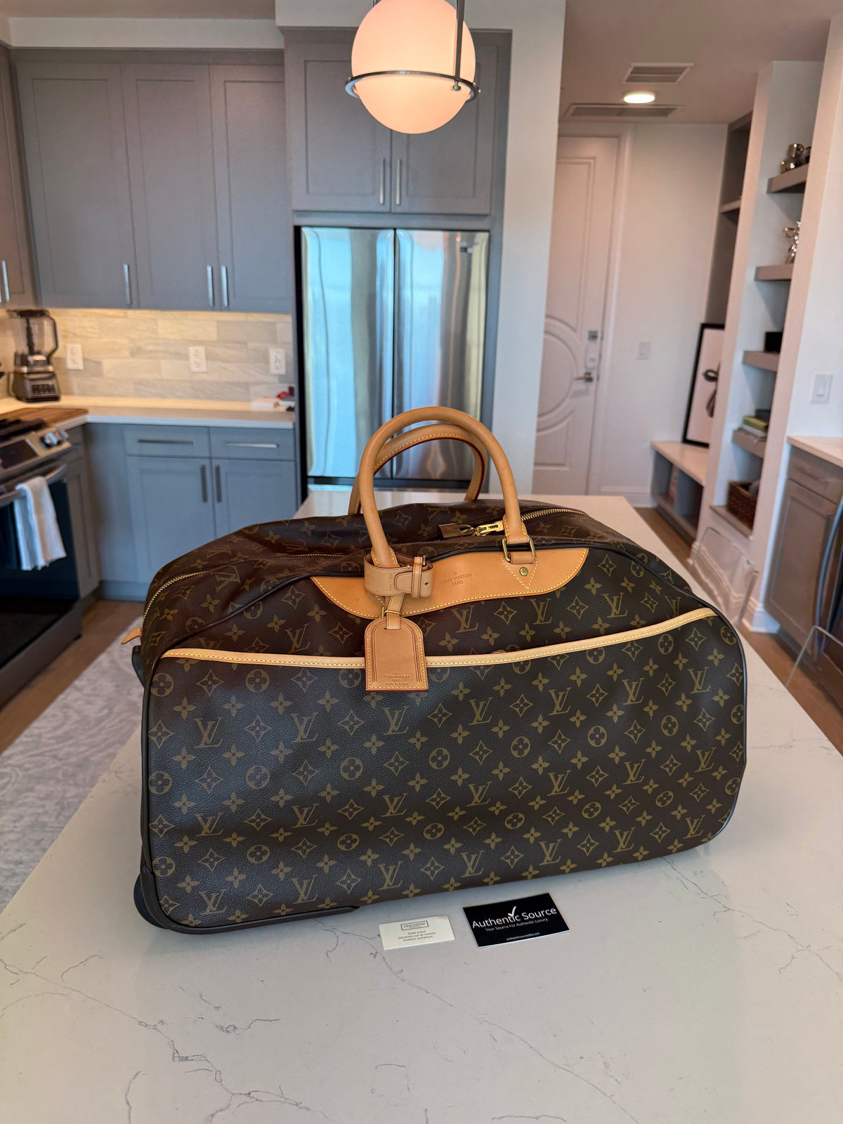 Louis Vuitton Eole Rolling Duffle