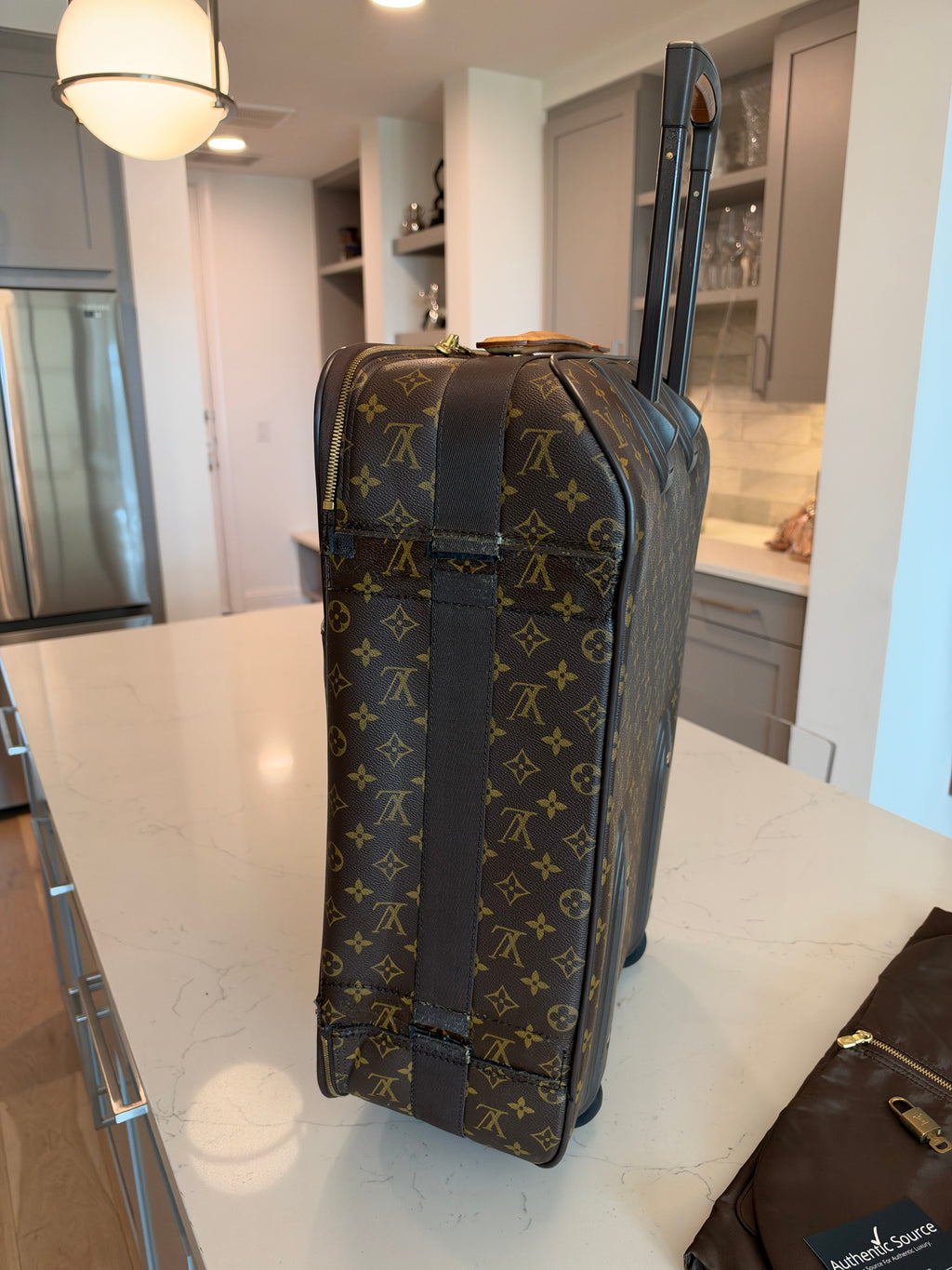 Louis Vuitton - Pegase 55 Rolling Luggage