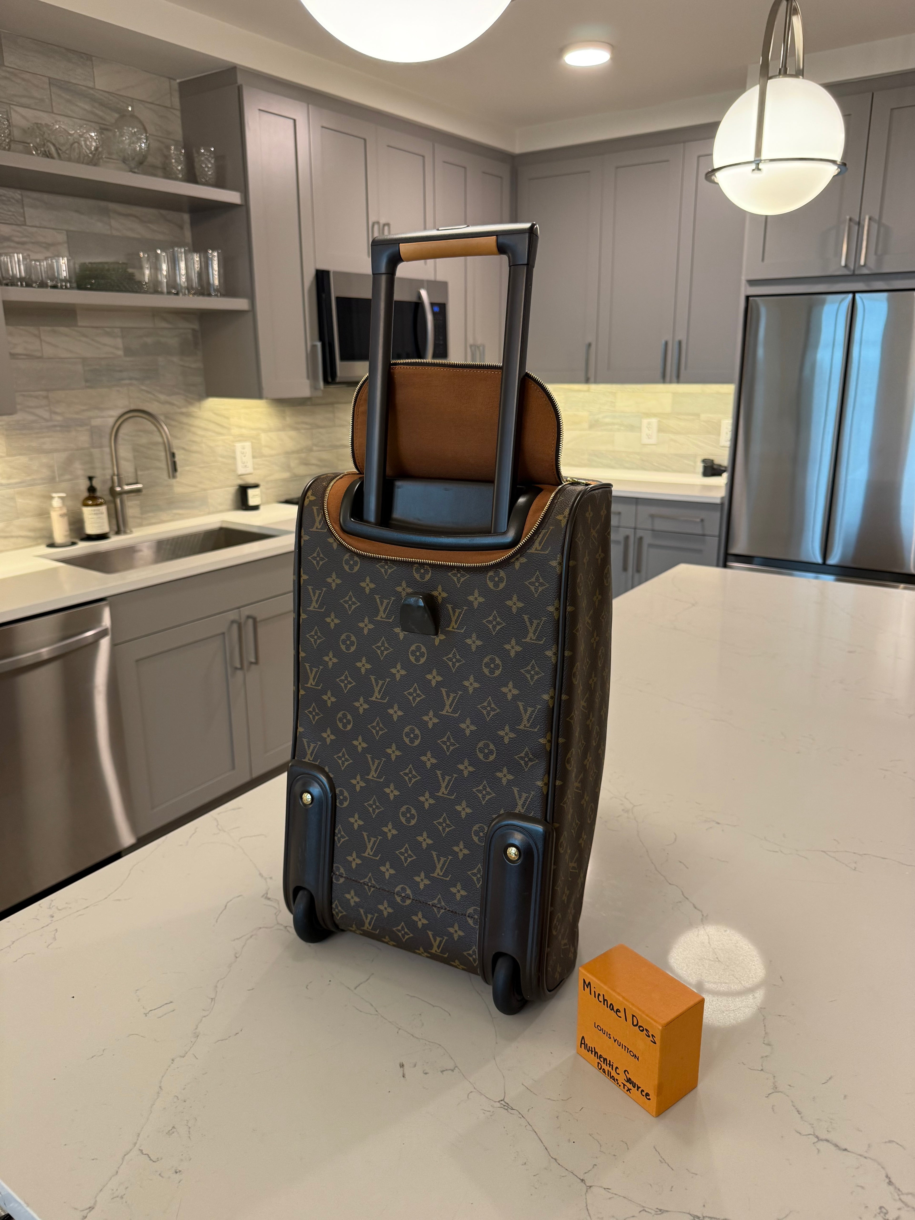 Louis Vuitton Eole 50 Rolling Duffle