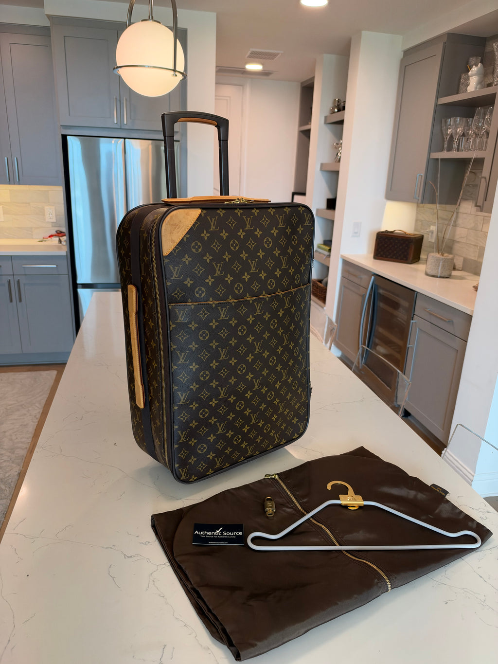 Louis Vuitton - Pegase 55 Rolling Luggage