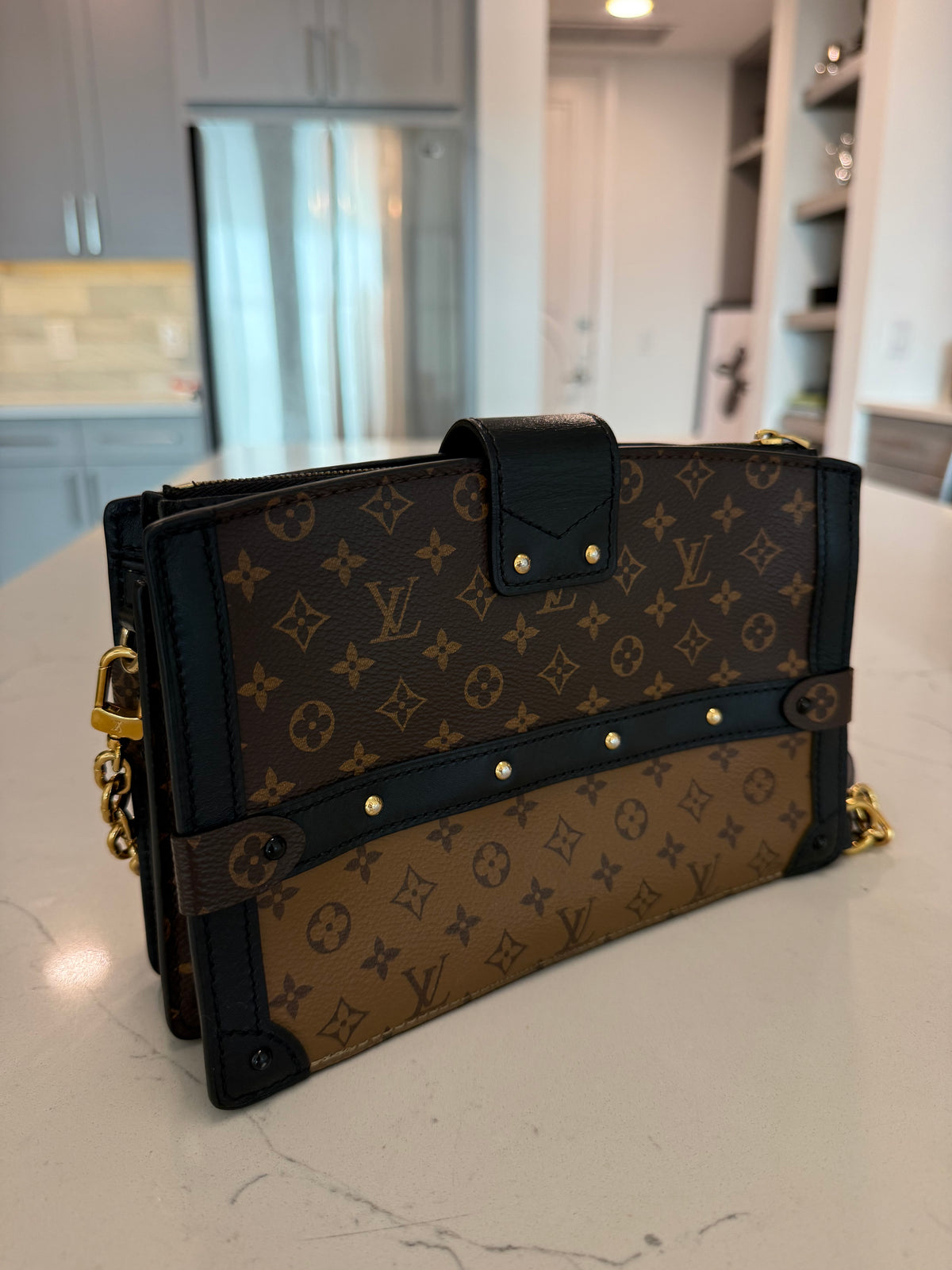 Louis Vuitton Reverse Monogram Trunk Clutch