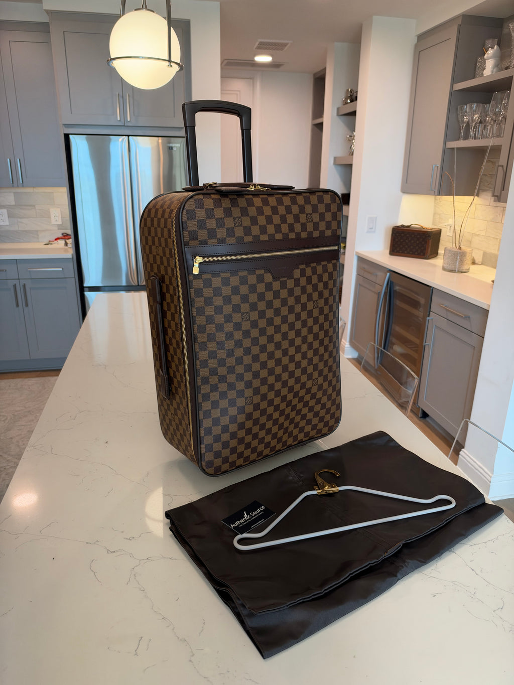 Louis Vuitton - Pegase 55 Rolling Luggage