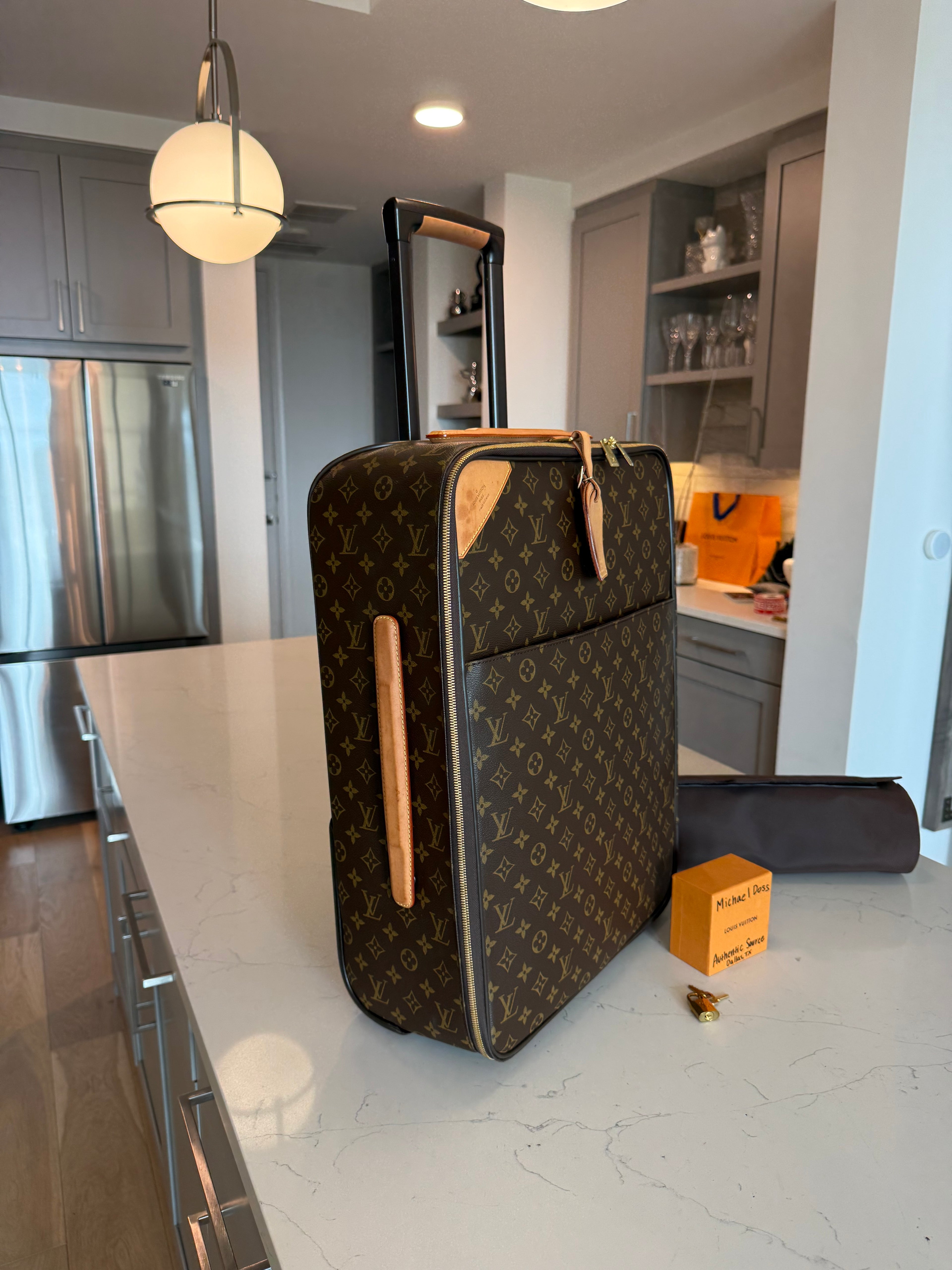Louis Vuitton Pegase 55 Rolling Luggage
