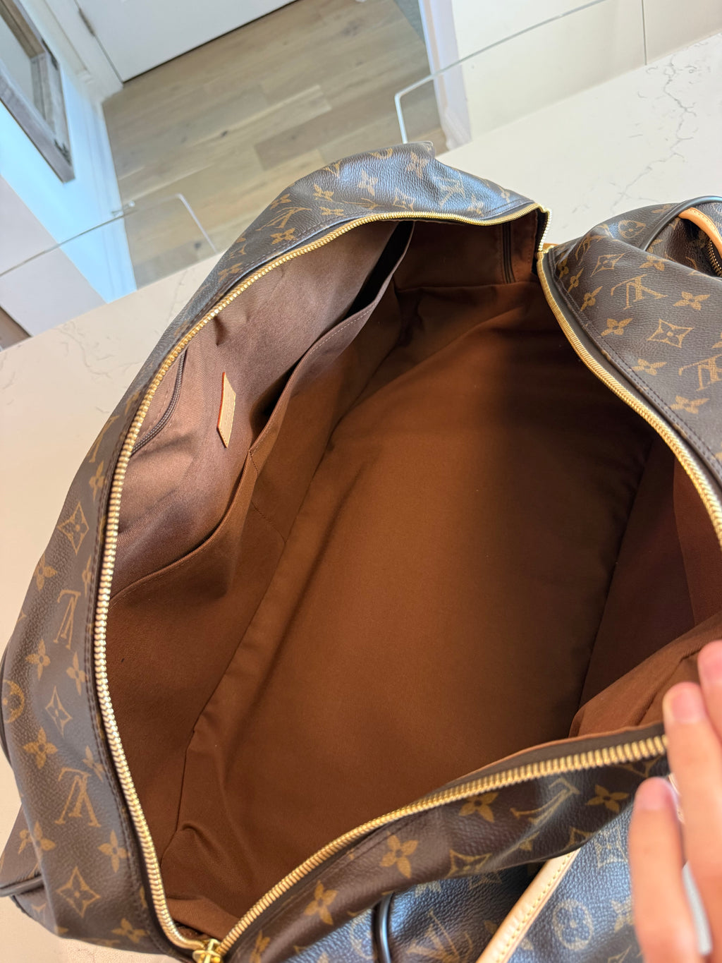 Louis Vuitton Eole Rolling Duffle