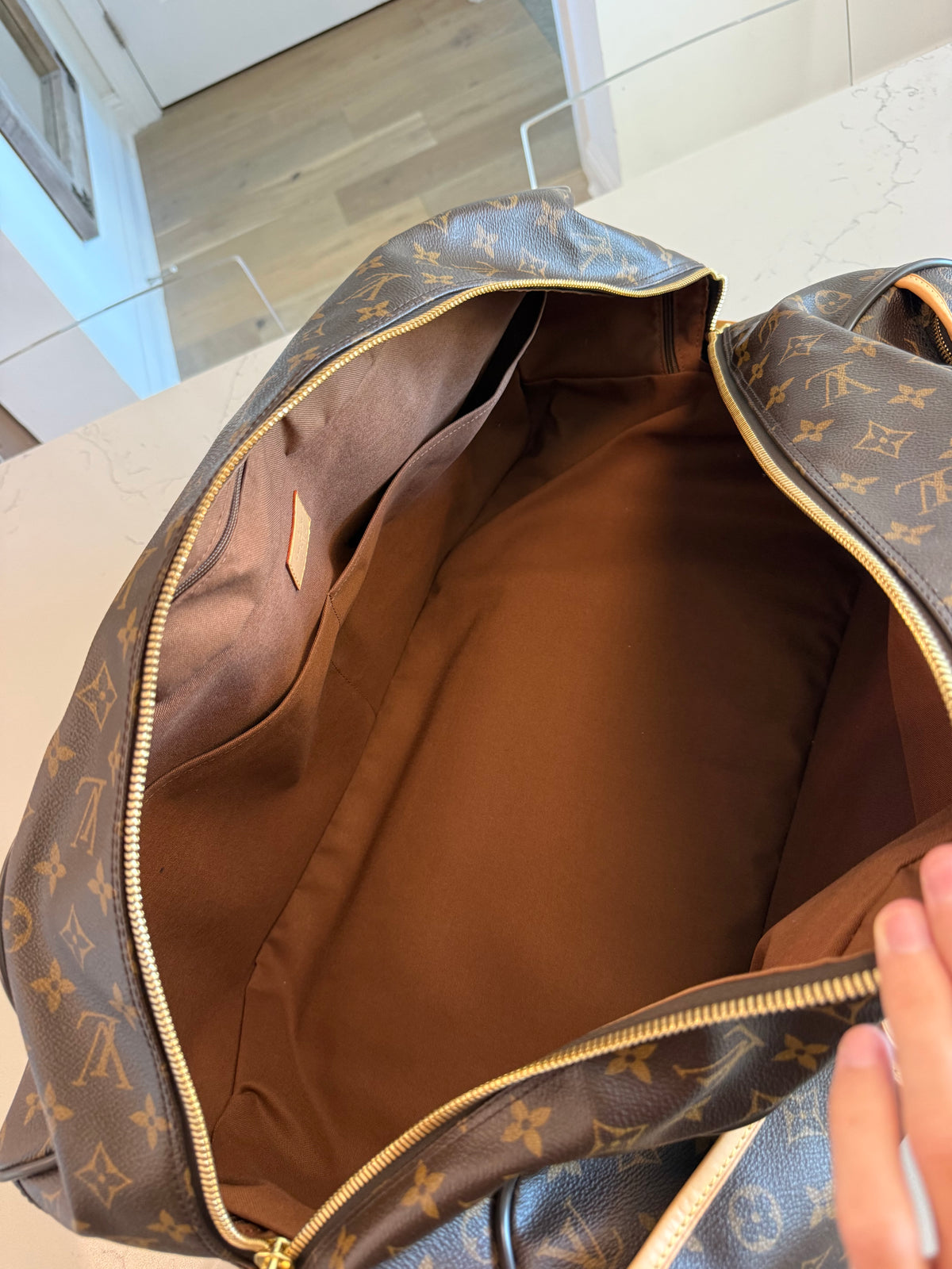 Louis Vuitton Eole Rolling Duffle