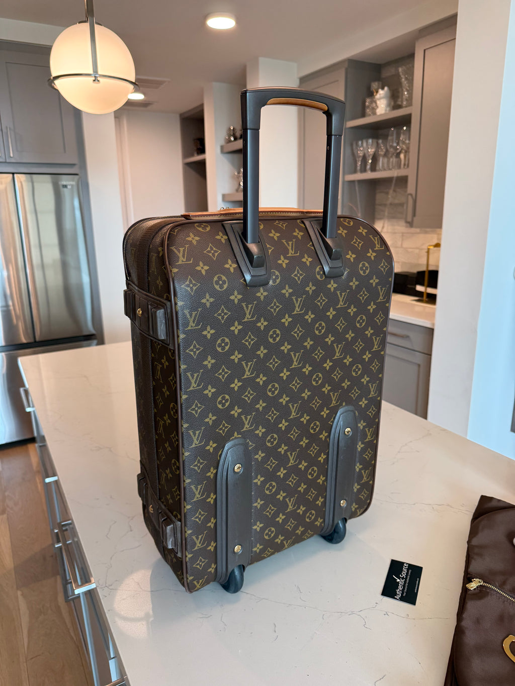 Louis Vuitton Pegase 55 Rolling Luggage