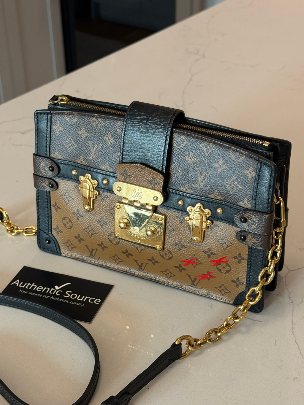 Louis Vuitton Reverse Monogram Trunk Clutch
