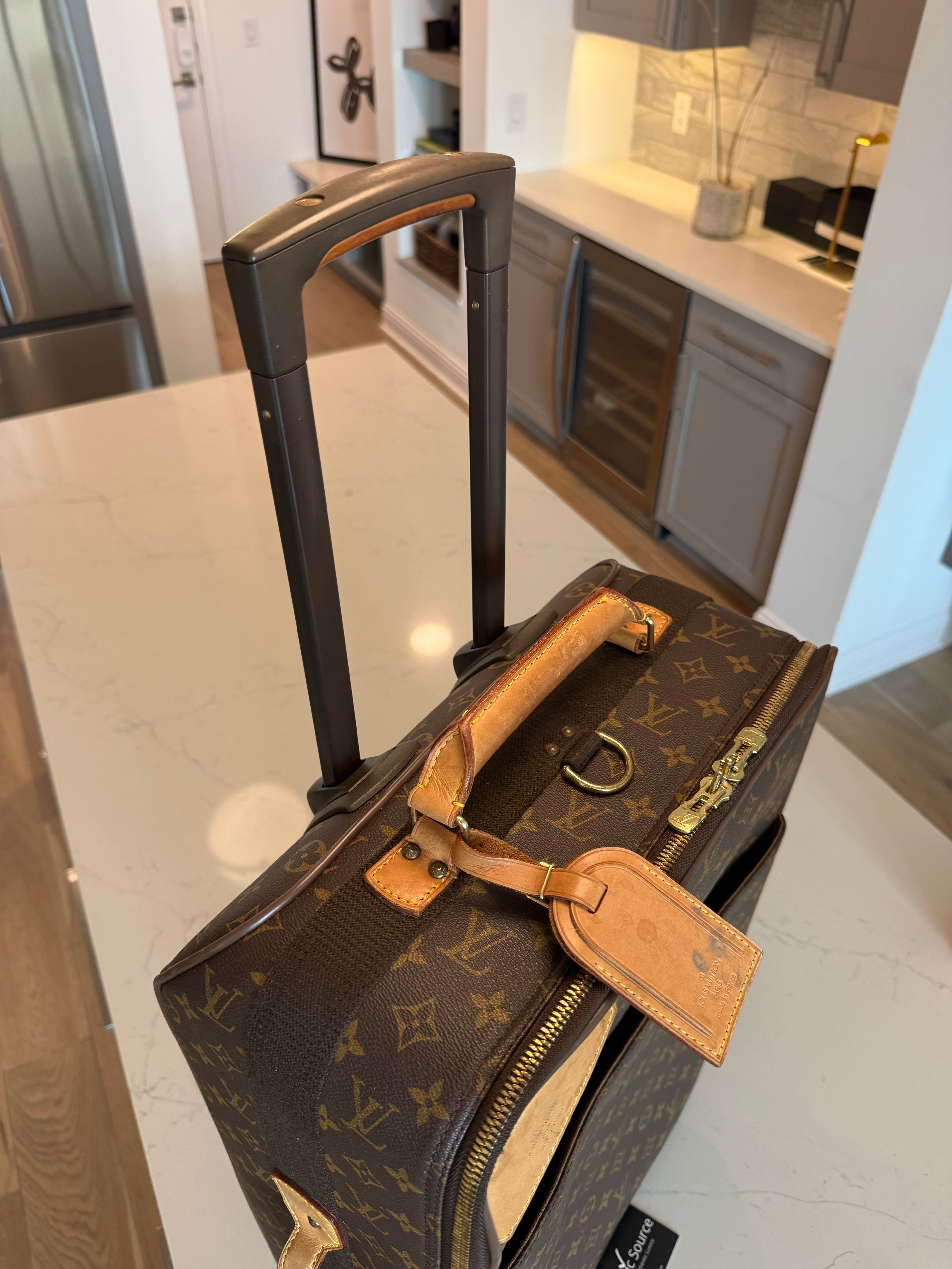 Louis Vuitton Pegase 55 Rolling Luggage
