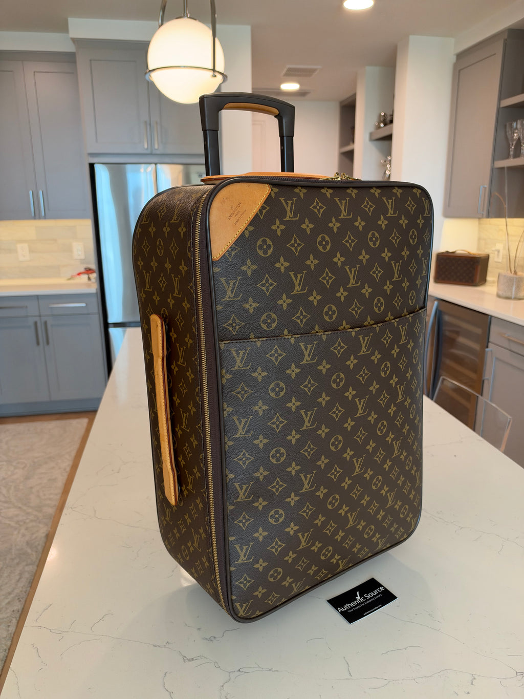 Louis Vuitton - Pegase 55 Rolling Luggage