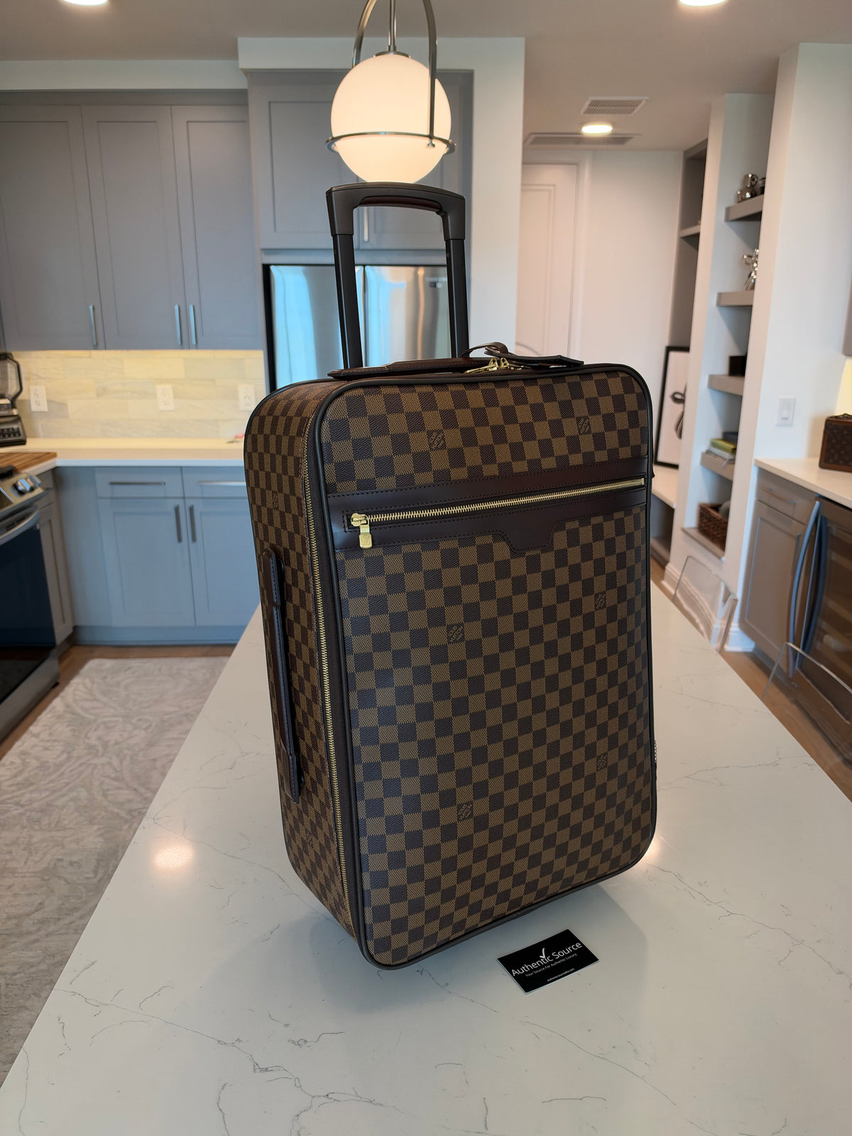 Louis Vuitton - Pegase 55 Rolling Luggage