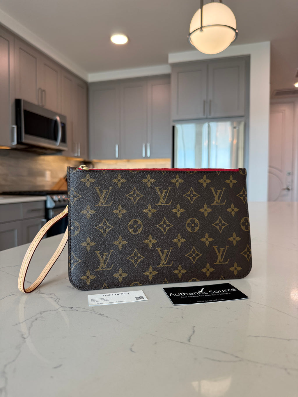 2 Louis Vuitton Pouches
