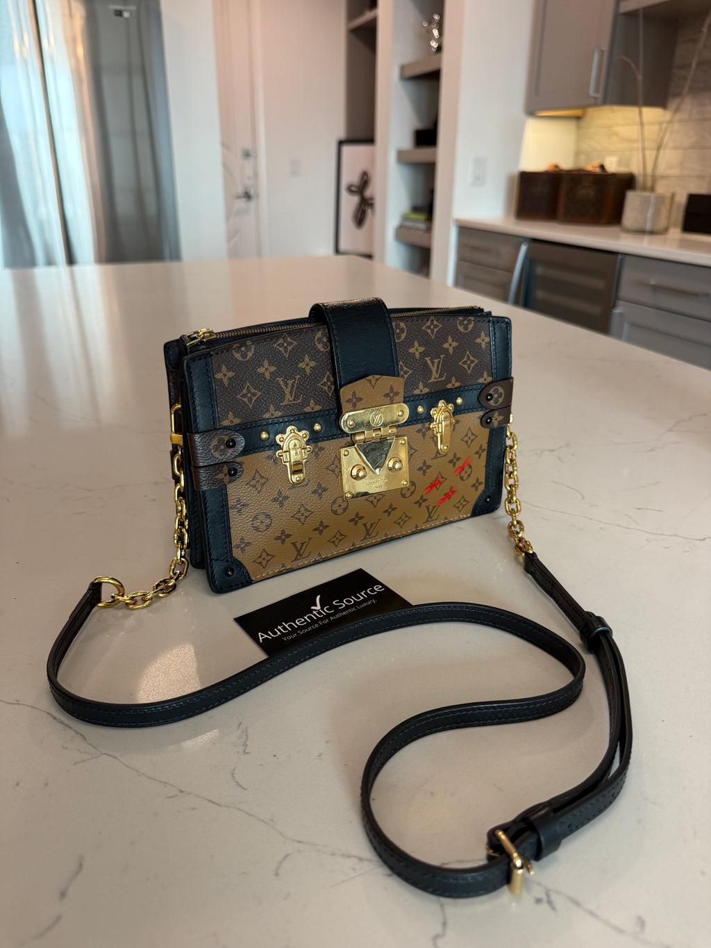 Louis Vuitton Reverse Monogram Trunk Clutch