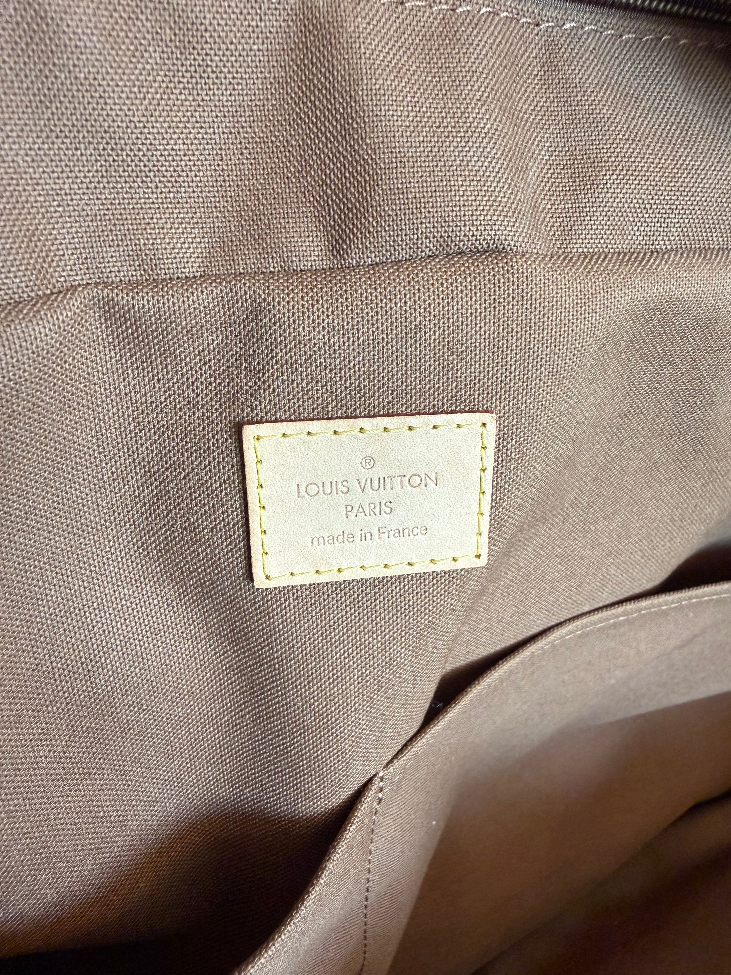 Louis Vuitton Eole Rolling Duffle