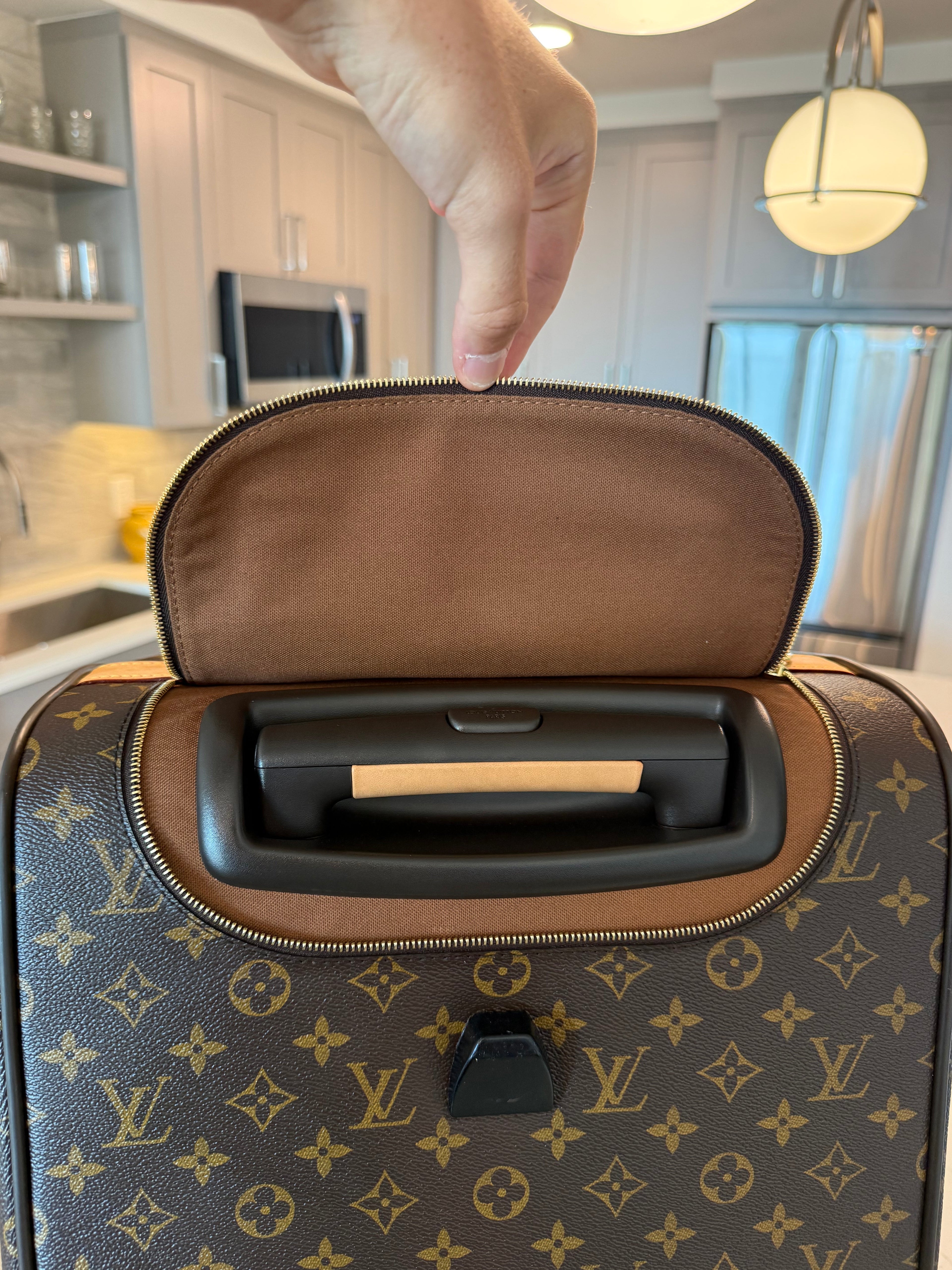 Louis Vuitton Eole Rolling Duffle