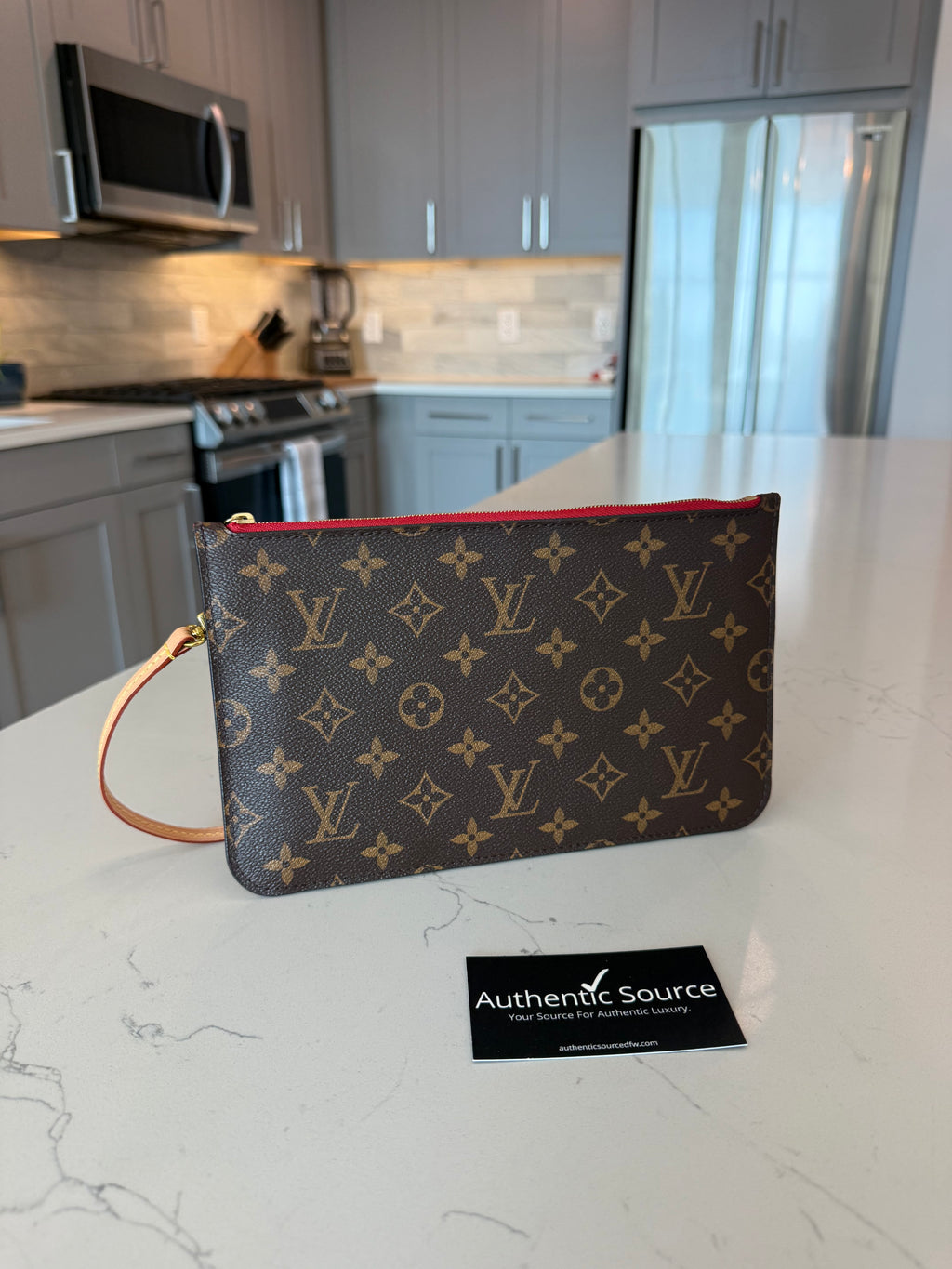 2 Louis Vuitton Pouches