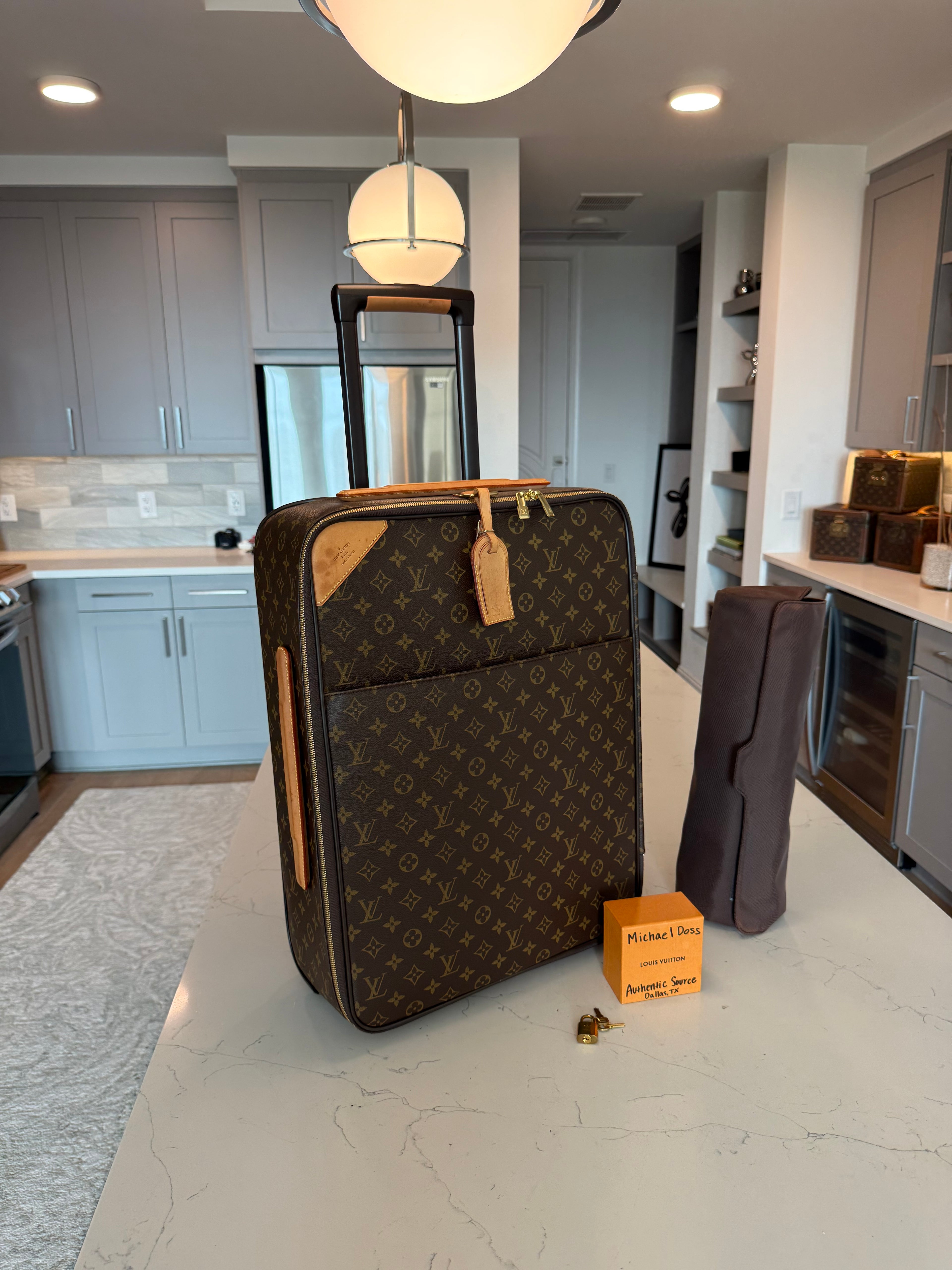 Louis Vuitton Pegase 55 Rolling Luggage