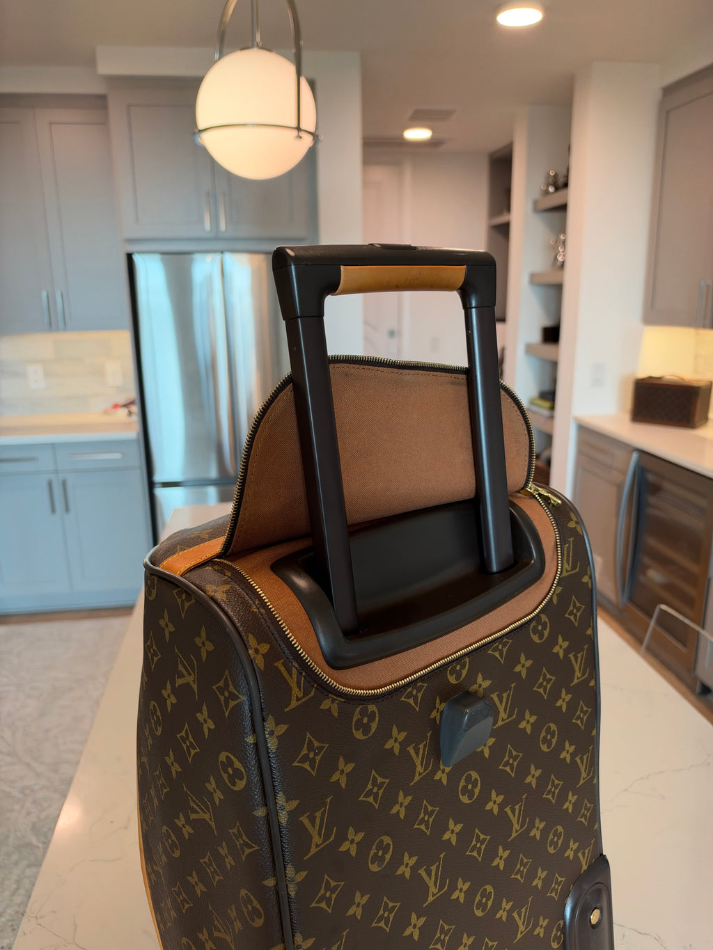 Louis Vuitton Eole 50 Rolling Duffle