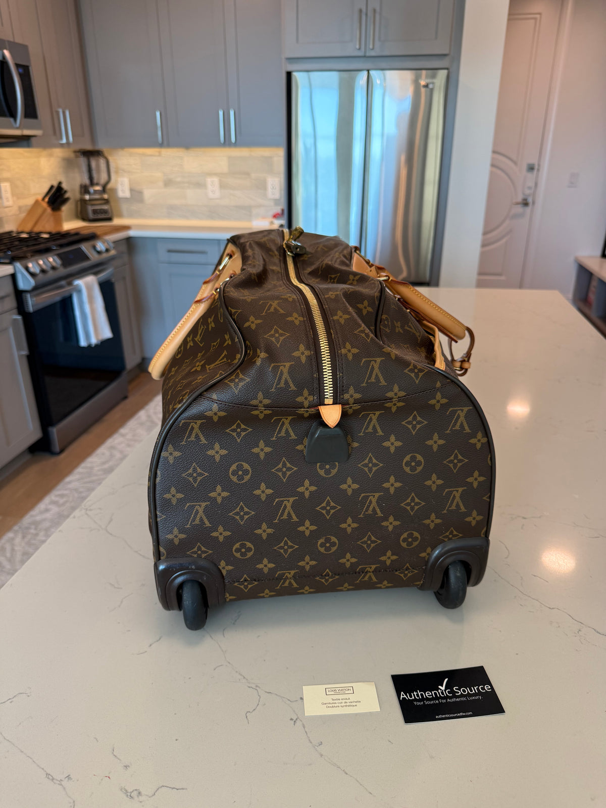 Louis Vuitton Eole Rolling Duffle