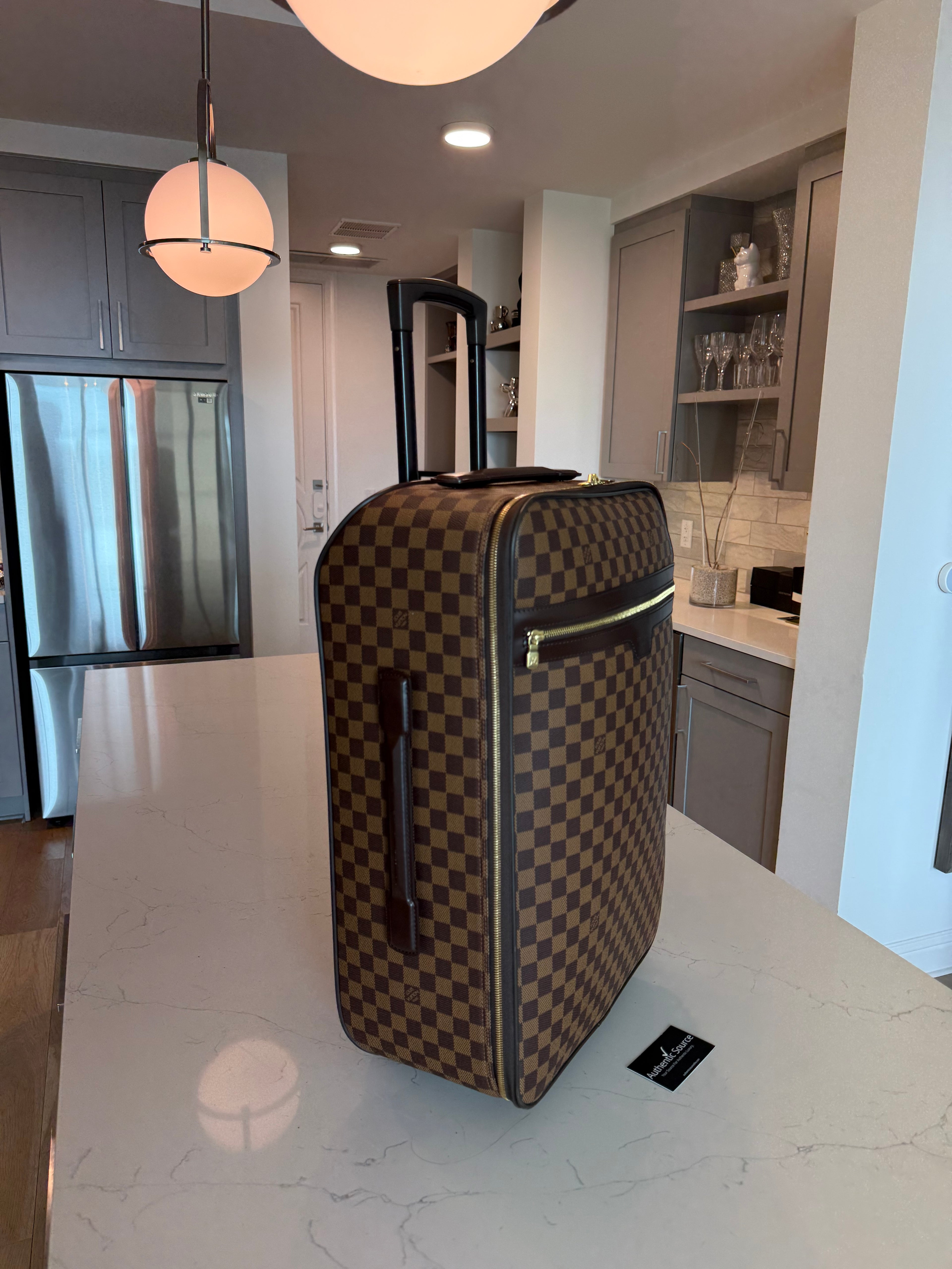 Louis Vuitton Pegase 55 Rolling Luggage