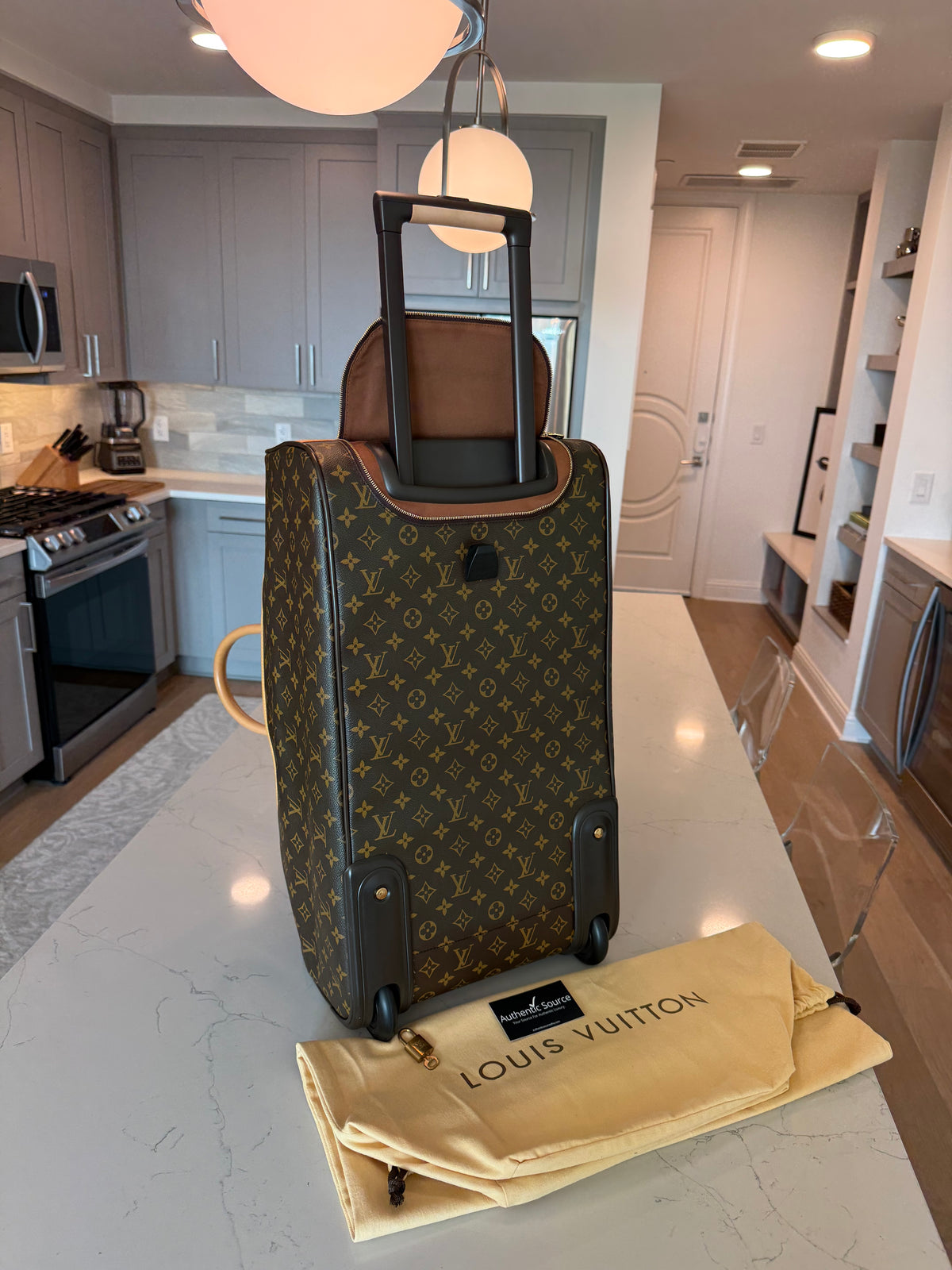 Louis Vuitton Eole Rolling Duffle