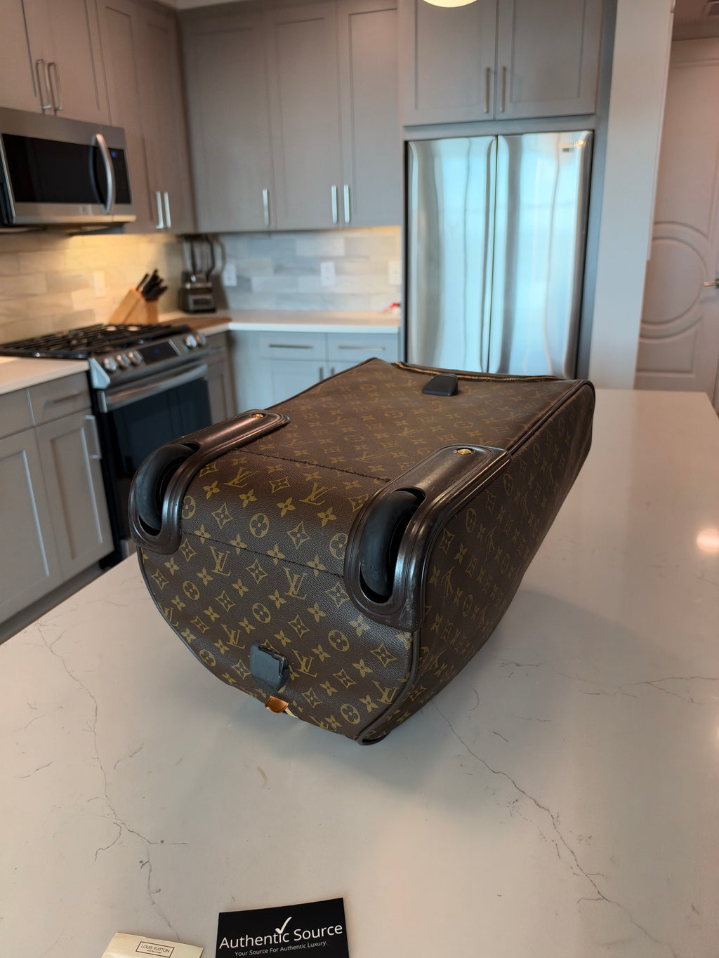 Louis Vuitton Eole 50 Rolling Duffle