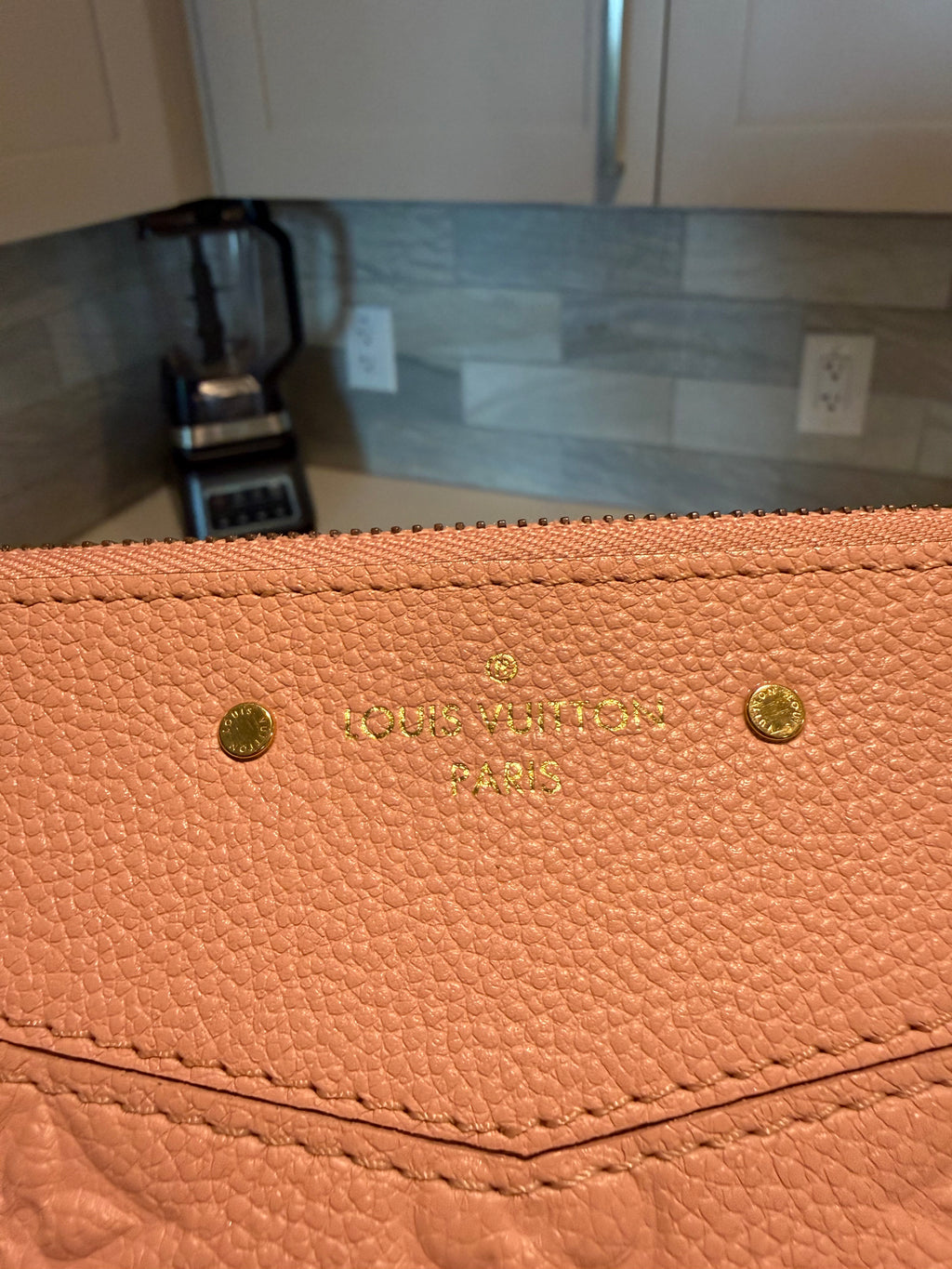 Louis Vuitton Daily Pouch Empreinte Rose