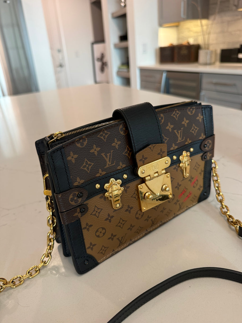Louis Vuitton Reverse Monogram Trunk Clutch