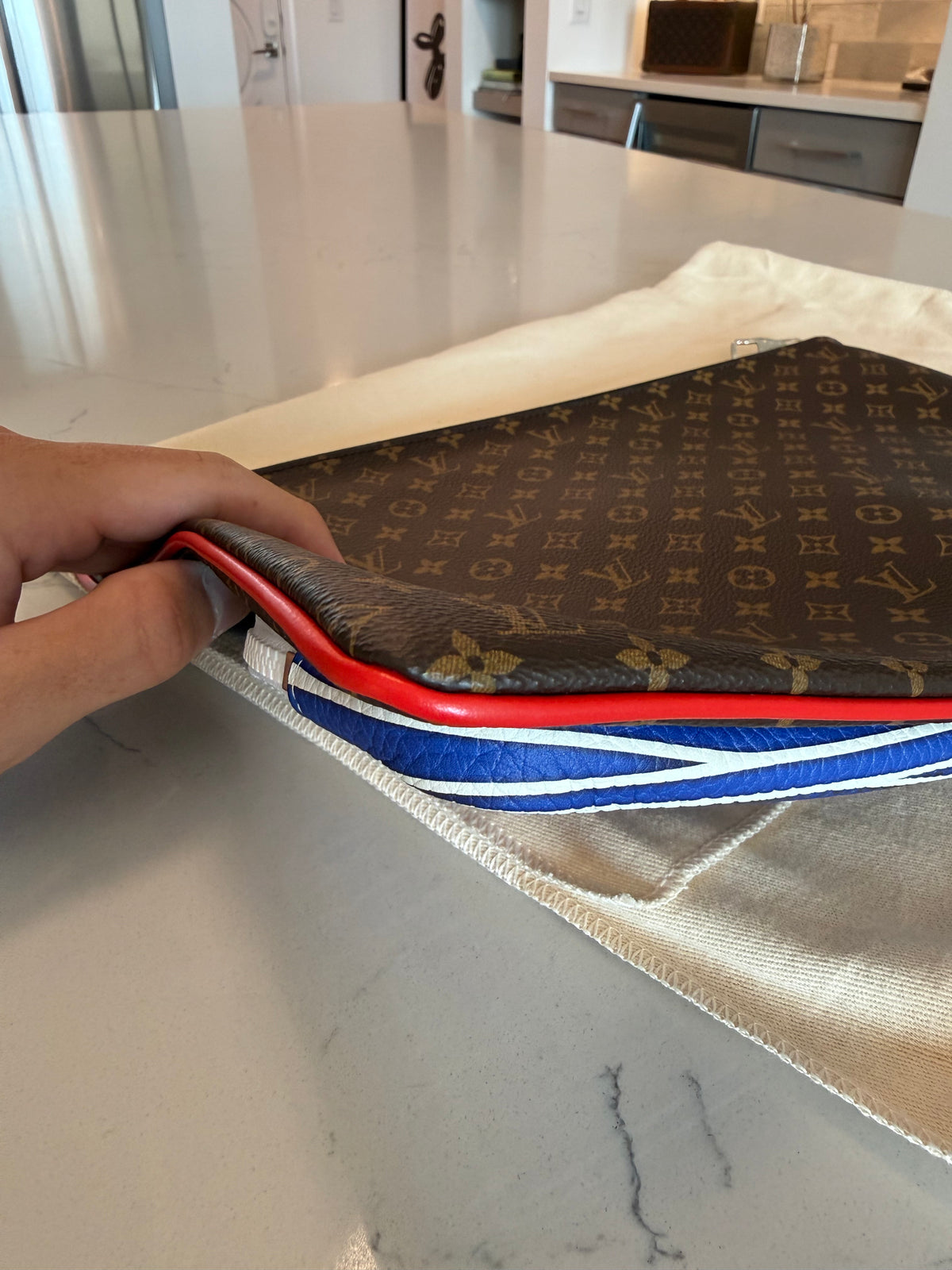 Louis Vuitton Monogram A4 Multipocket Pochette