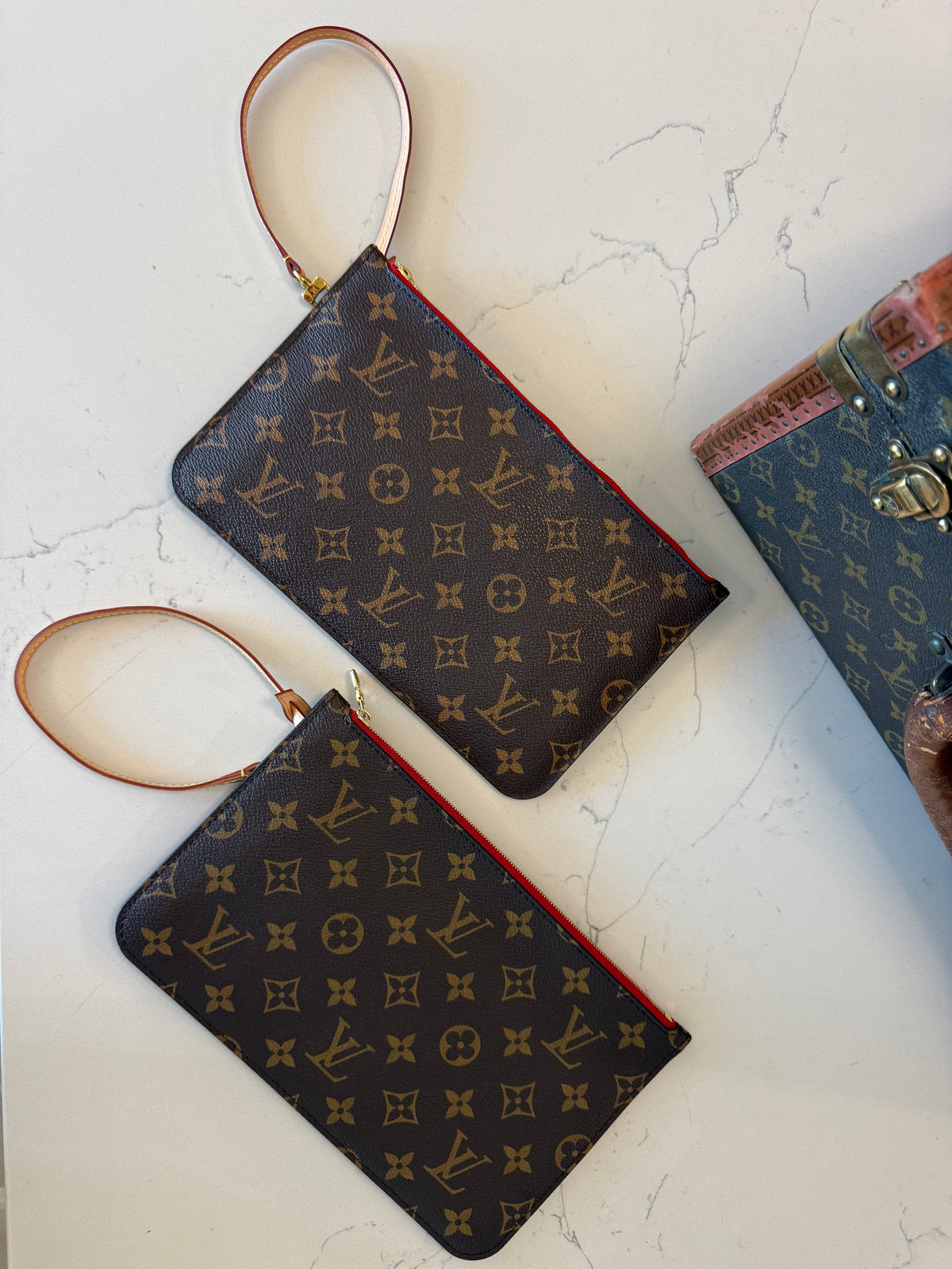 2 Louis Vuitton Pouches