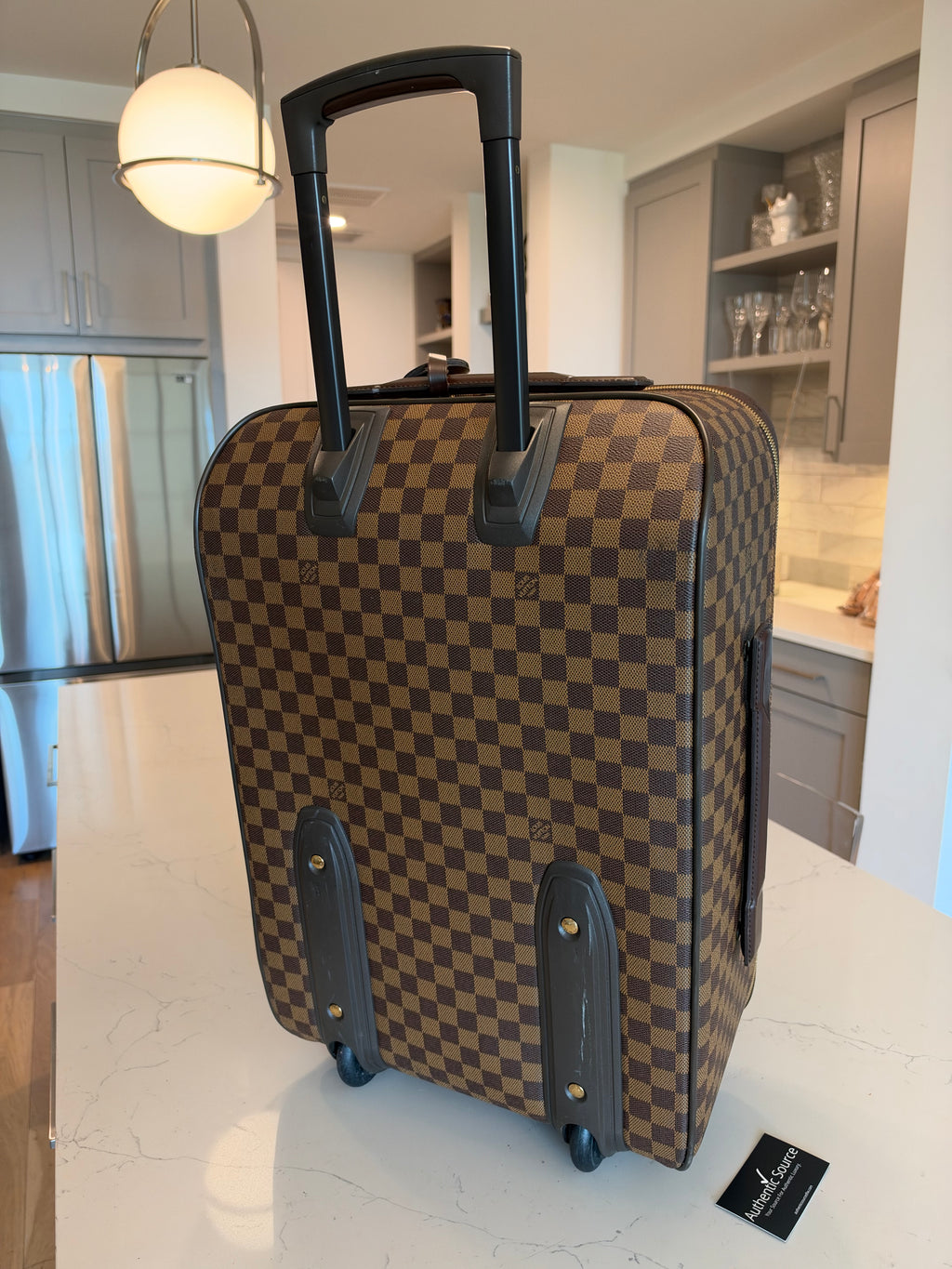Louis Vuitton - Pegase 55 Rolling Luggage