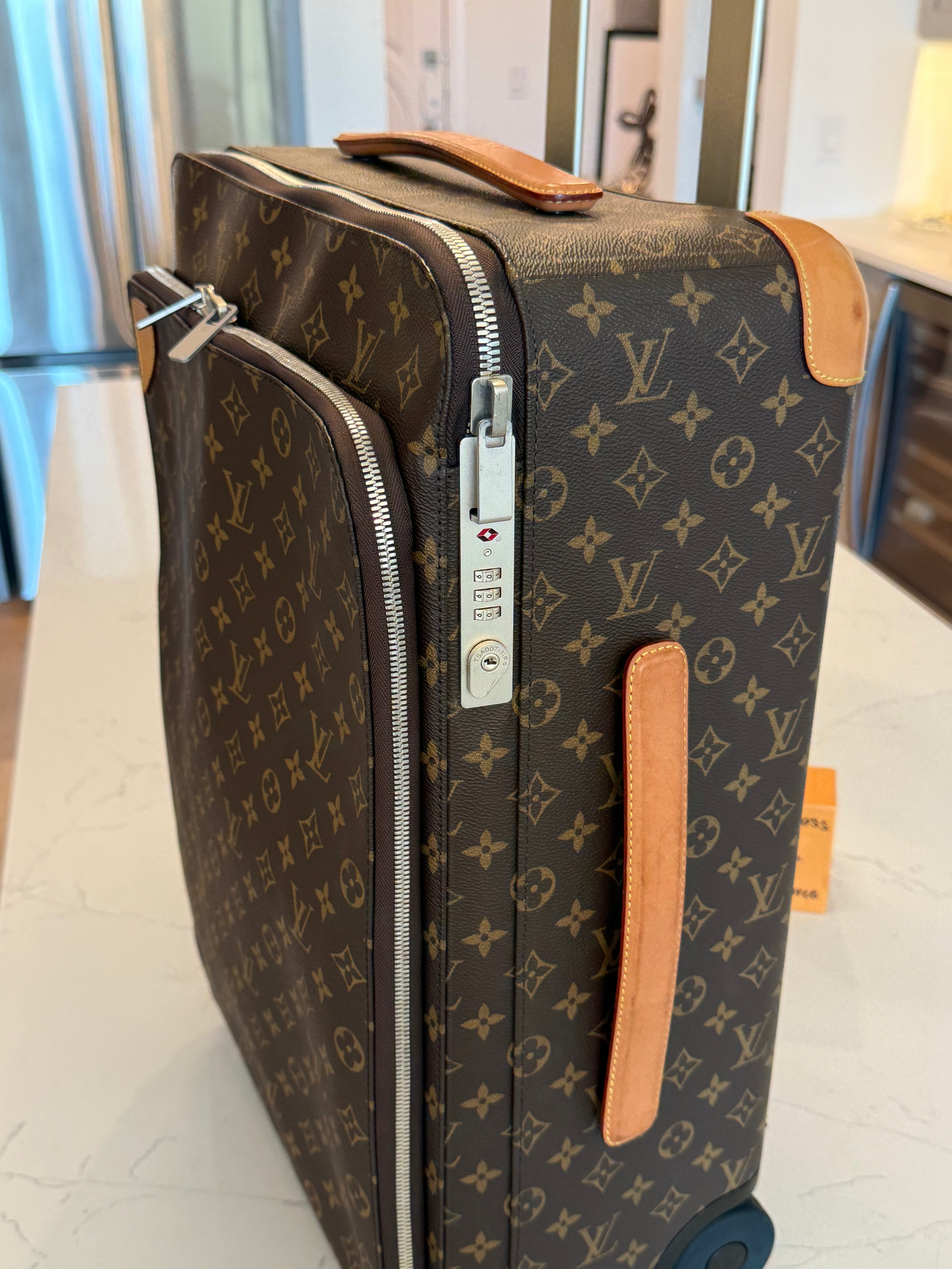 Louis Vuitton New Model Pegase 55 Rolling Luggage